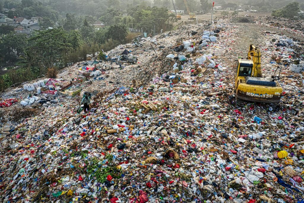 Aerial shot of a waste landfill in South Tangerang, showcasing pollution issues.